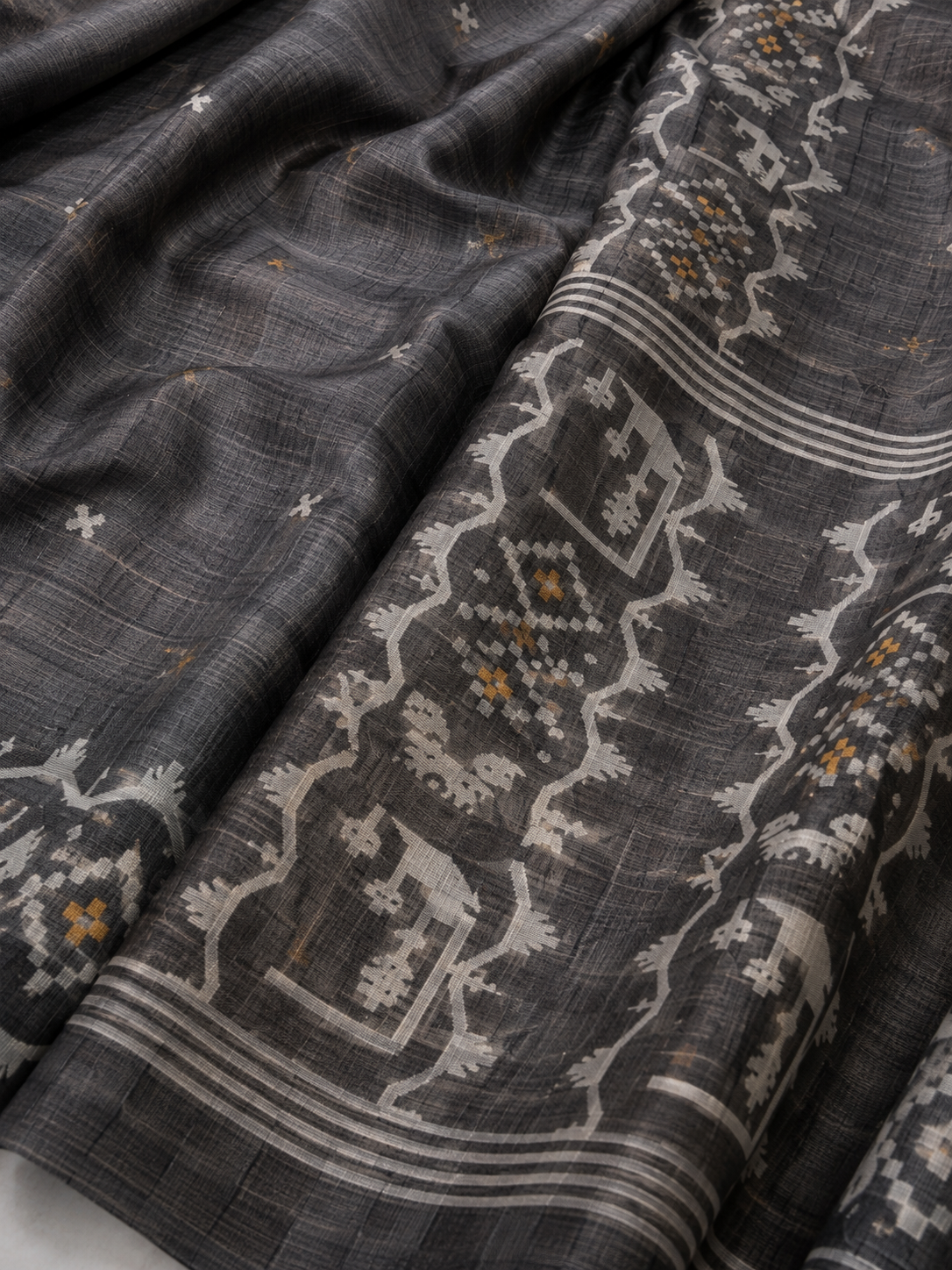 Dark grey tussar Jamdani saree