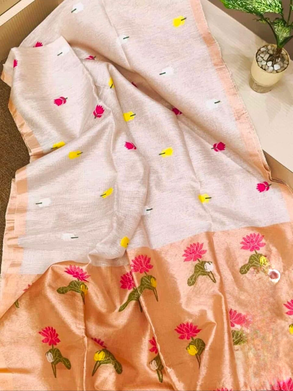 White silk Linen Saree with floral motifs