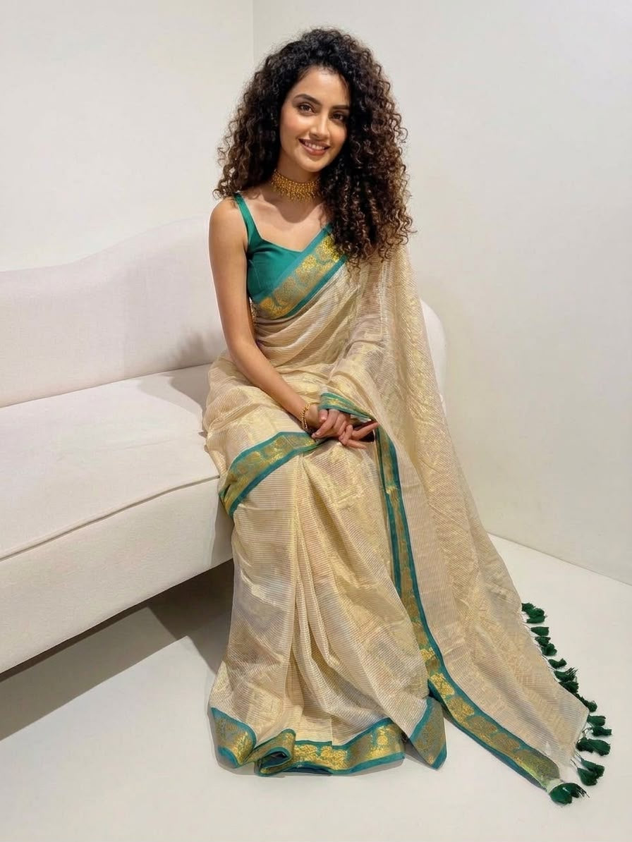 Zari striped pure tissue mul cotton saree Rama green border