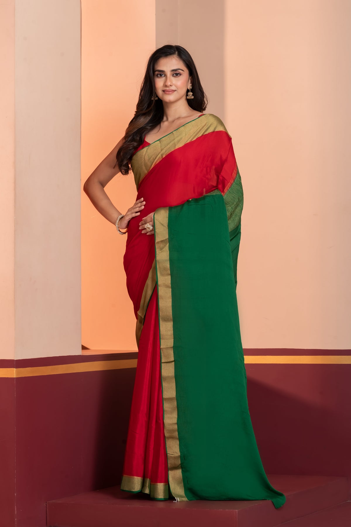 Bright red pure crepe silk zari border saree