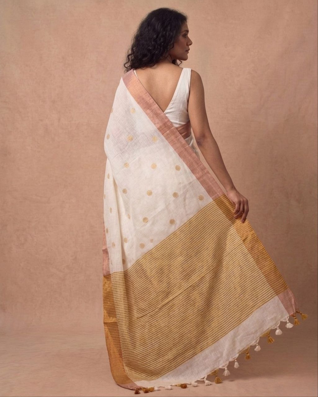 Off white mulmul cotton saree with gold dots