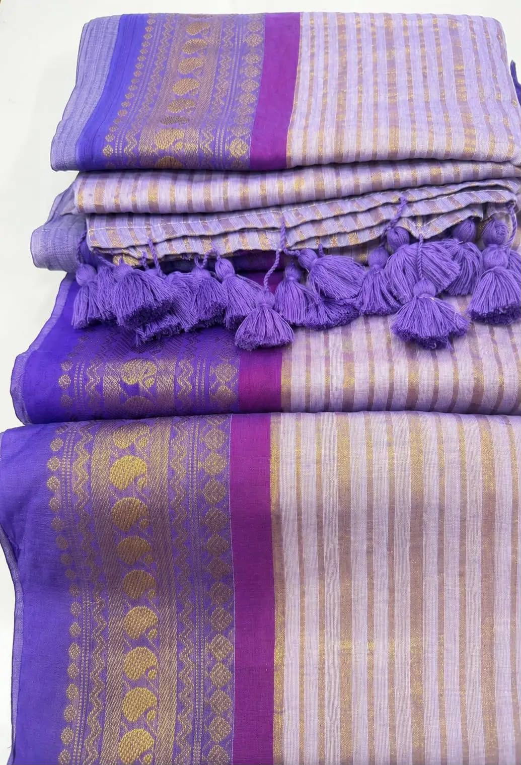 Off white striped base mauve kanchi border mulmul saree