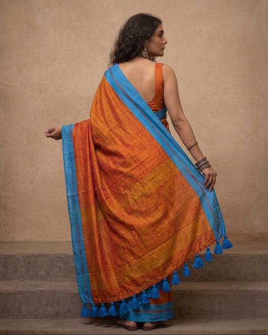 Orange mul cotton saree with blue border