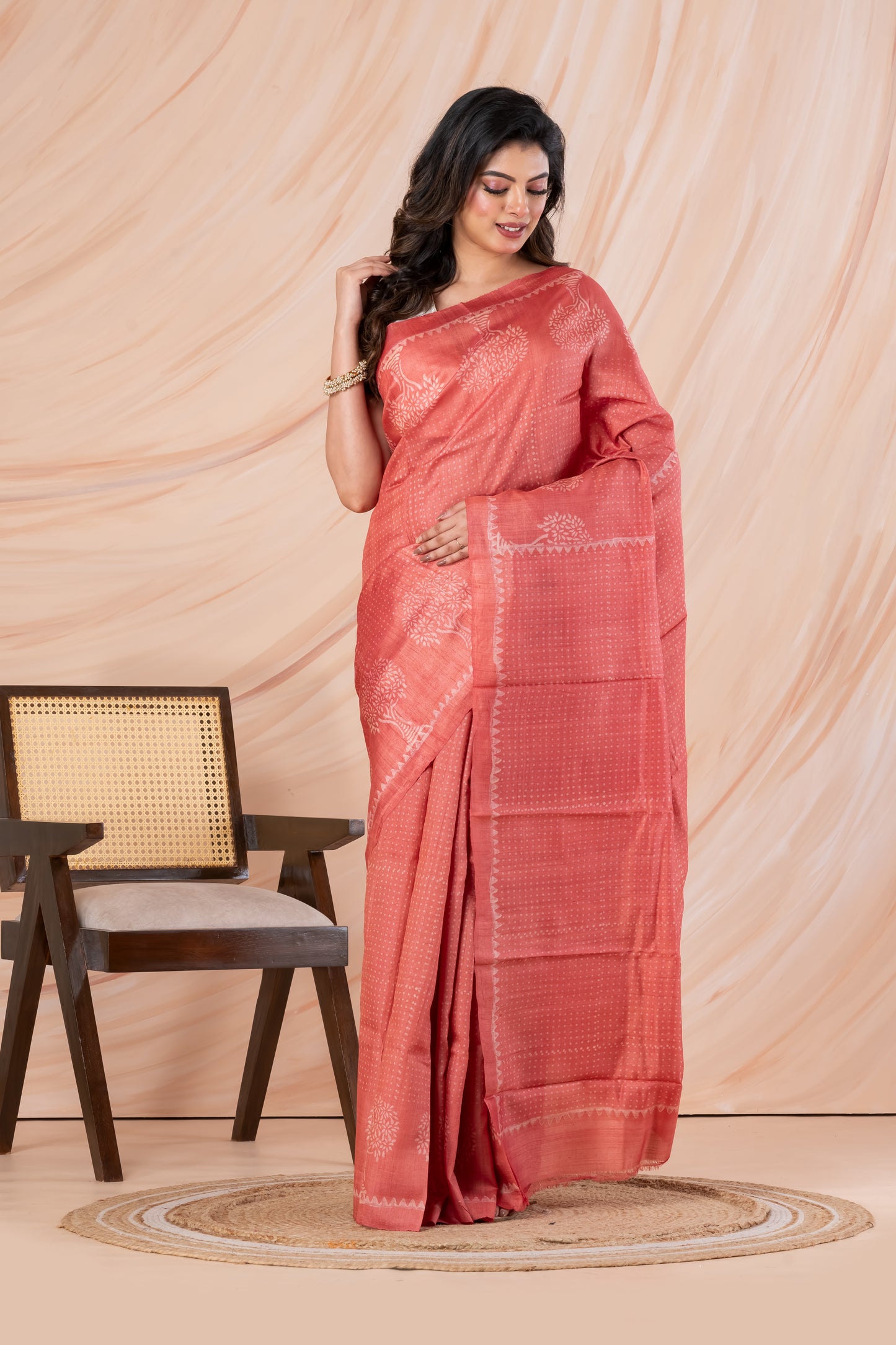 Peach pink tussar printed saree