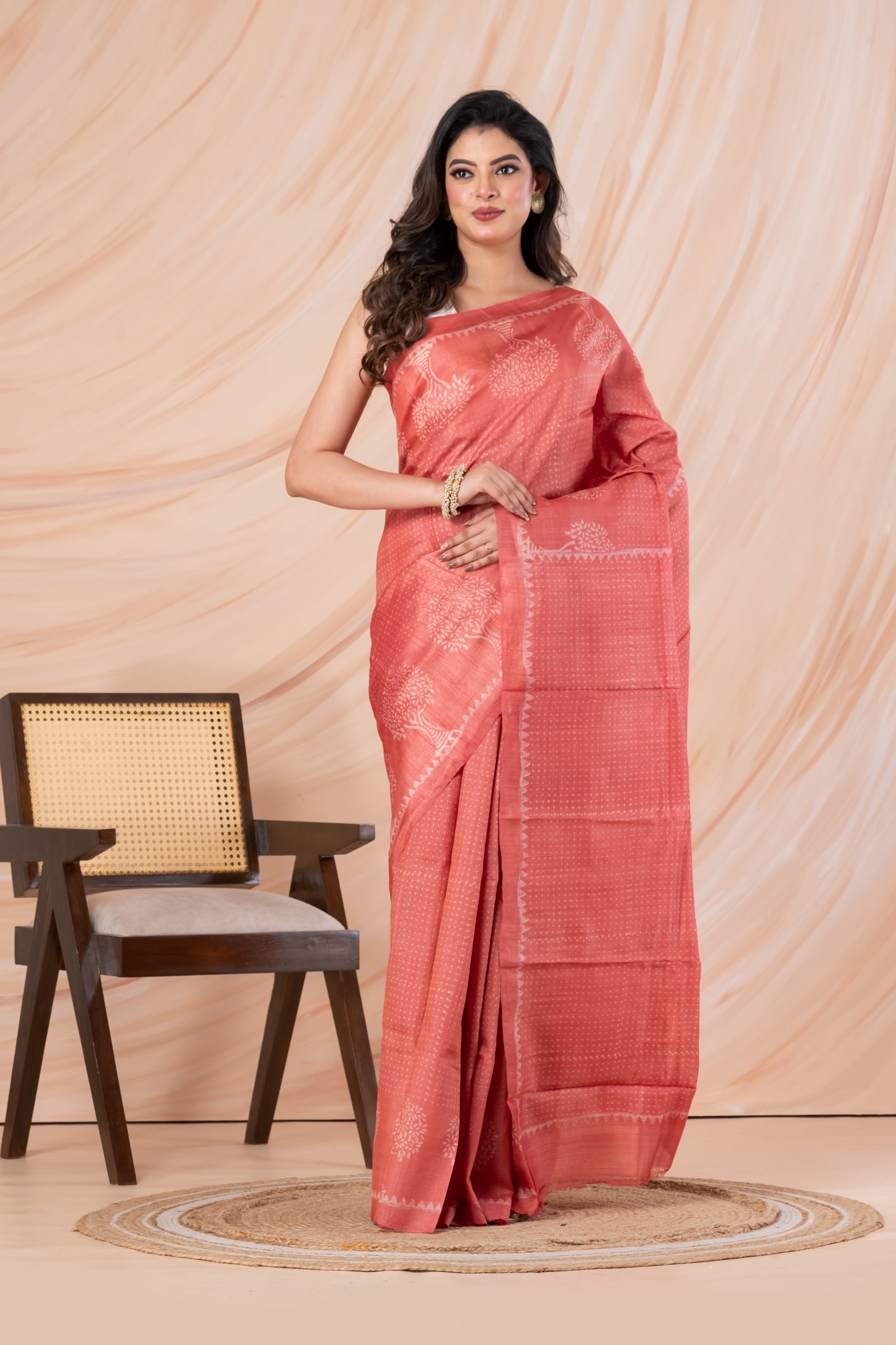 Peach pink tussar printed saree