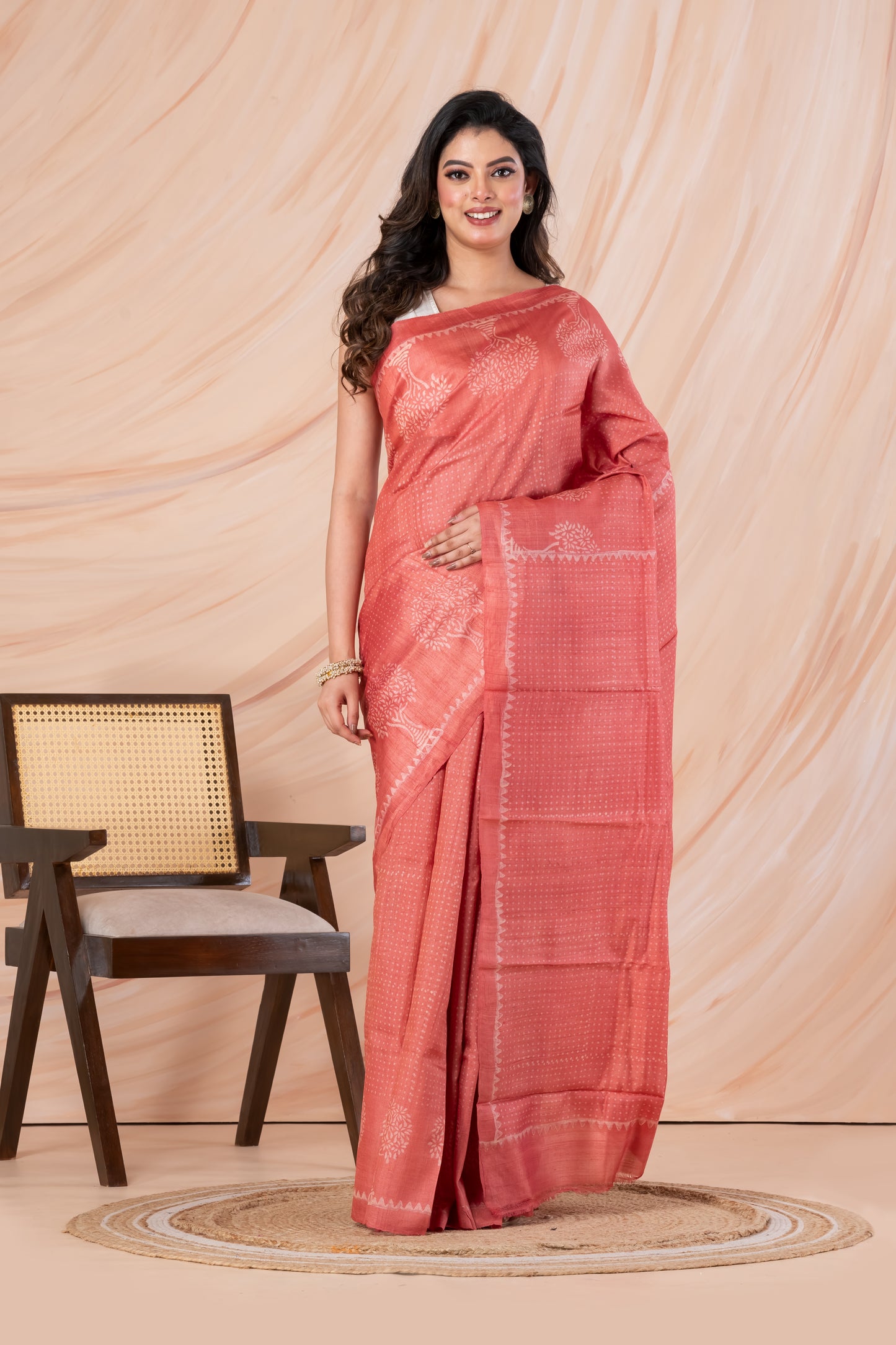 Peach pink tussar printed saree