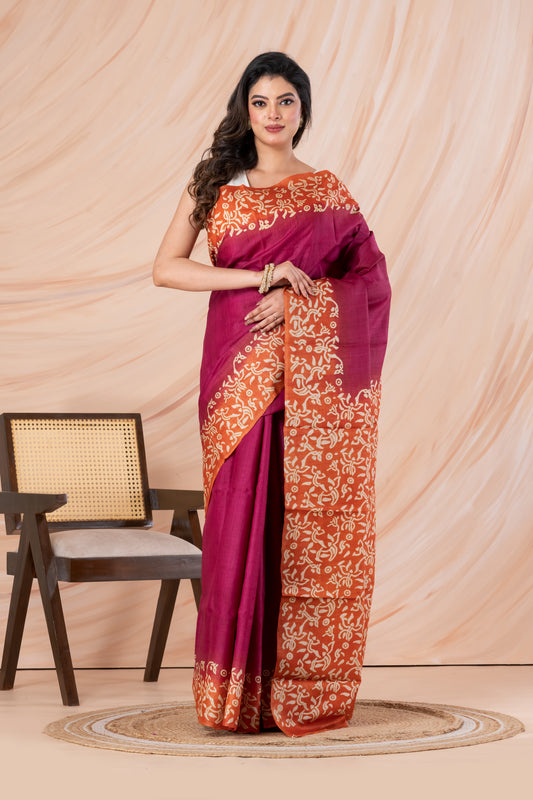 Deep pink with orange border tussar printed saree.