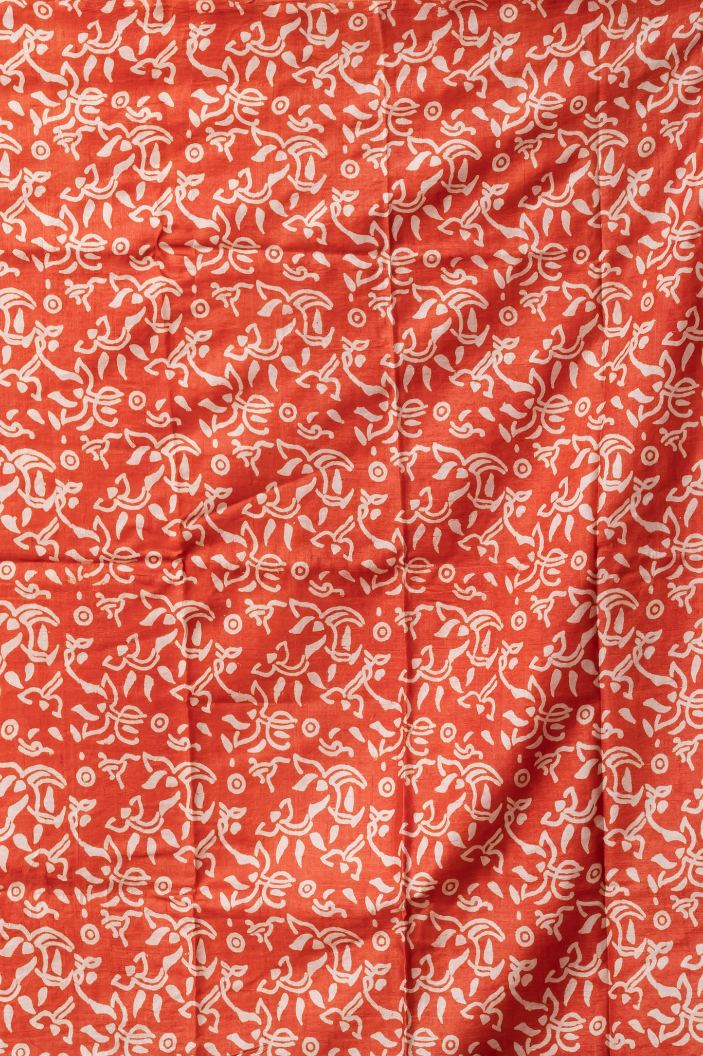 Purple body orange printed tussar saree.