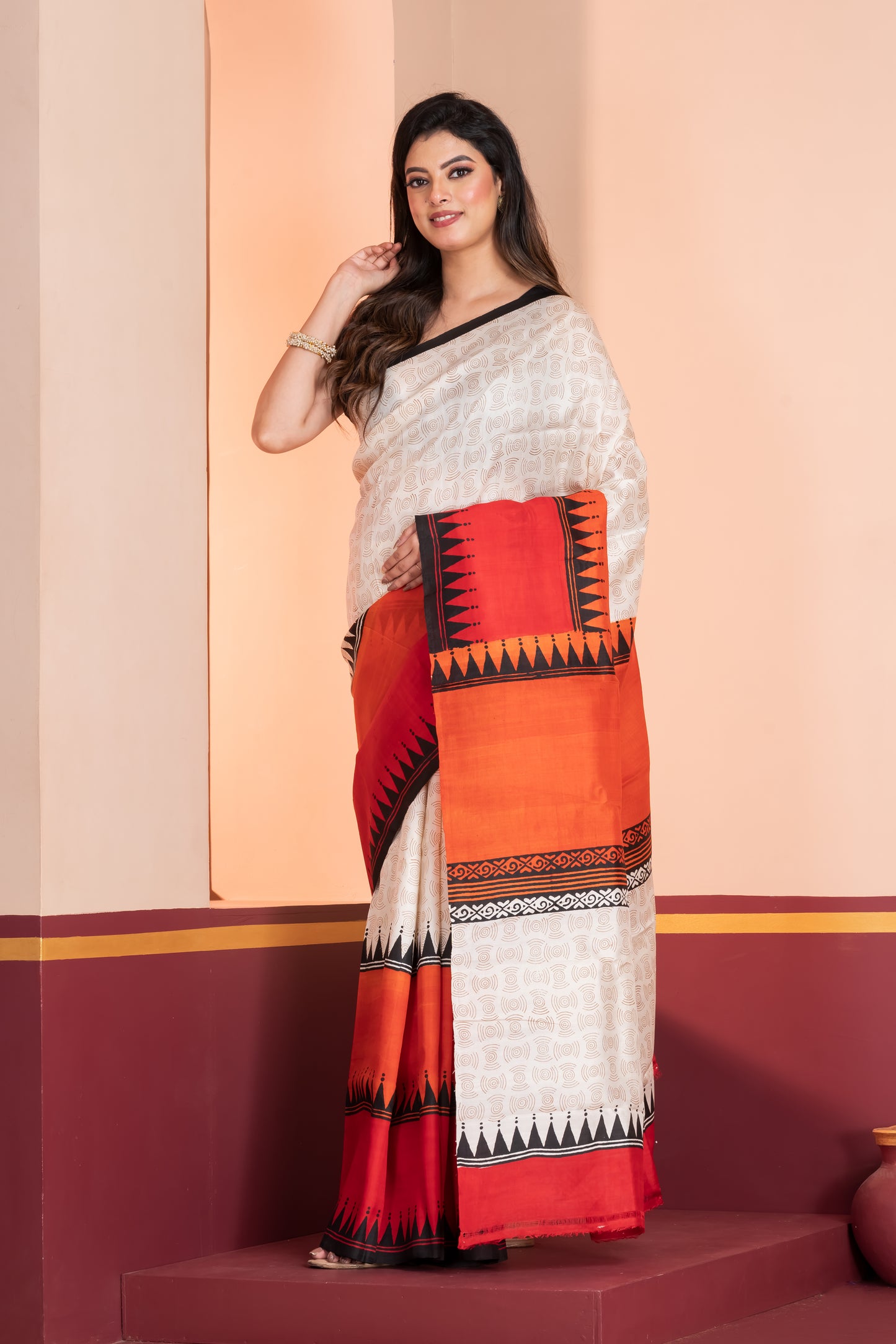 Red and orange skirt border printed pure silk saree