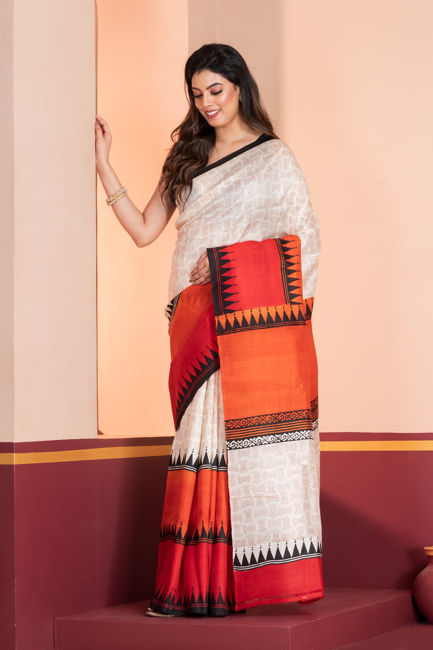 Red and orange skirt border printed pure silk saree