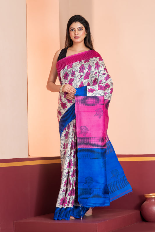 Blue and pink striped border silk saree leaf prints allover.