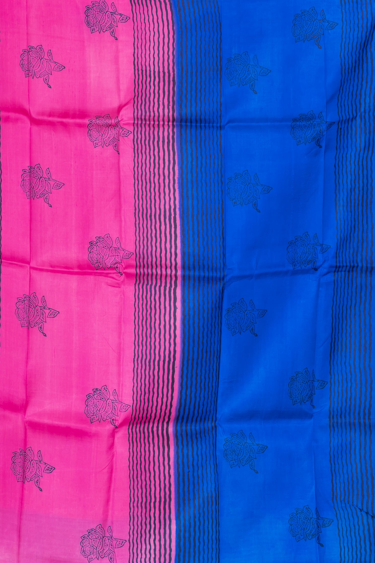 Blue and pink striped border silk saree leaf prints allover.