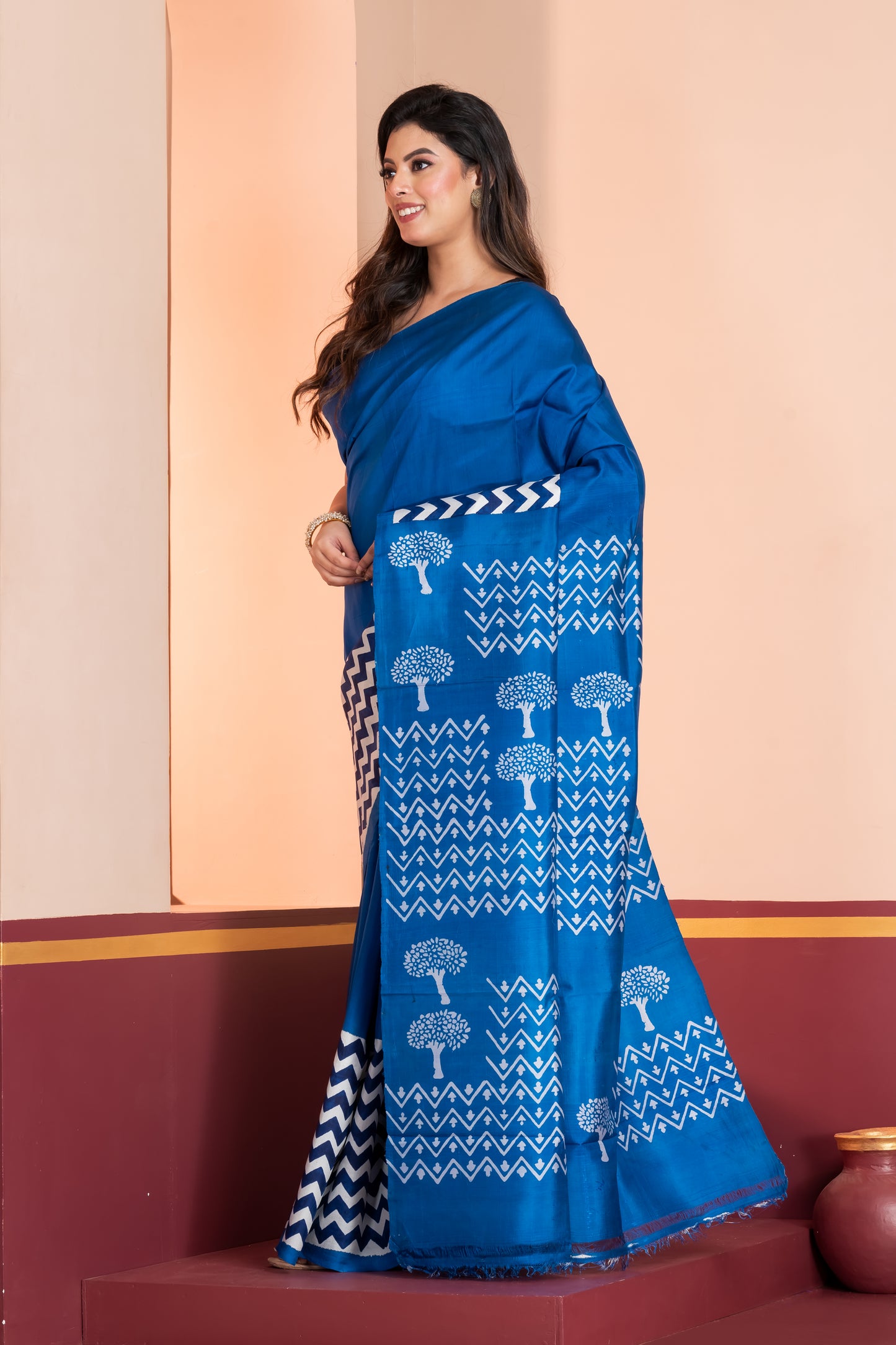 Royal blue 3ply silk. Paired with a plain blue blouse piece for a graceful finish.