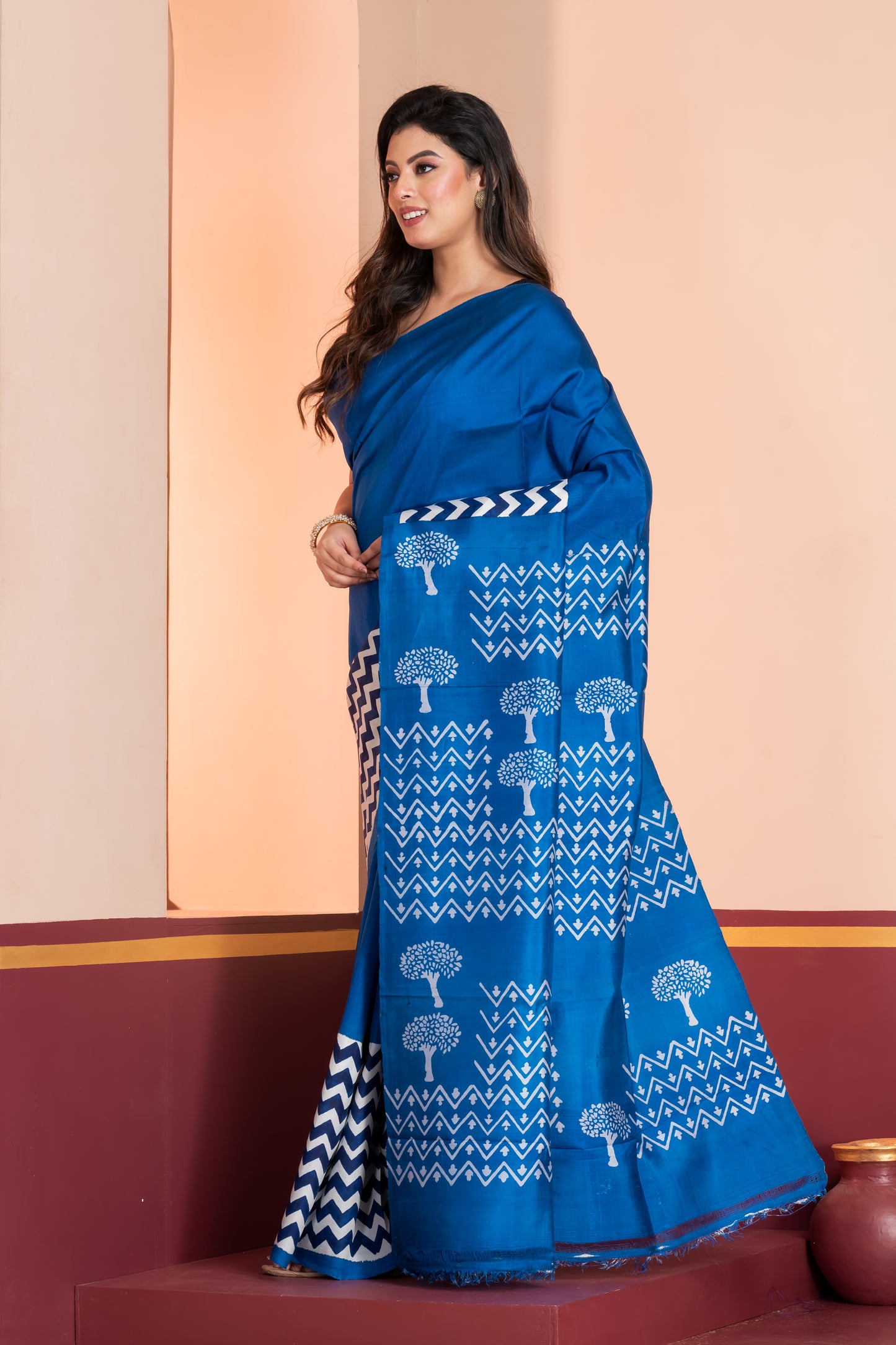 Royal blue 3ply silk. Paired with a plain blue blouse piece for a graceful finish.