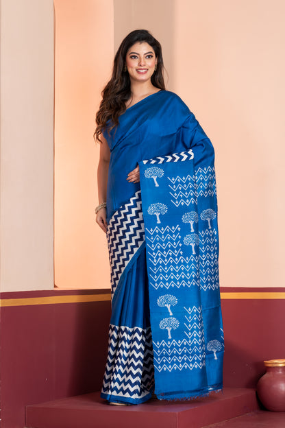 Royal blue 3ply silk. Paired with a plain blue blouse piece for a graceful finish.