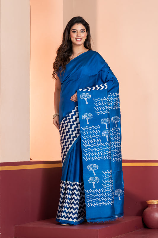 Royal blue 3ply silk. Paired with a plain blue blouse piece for a graceful finish.