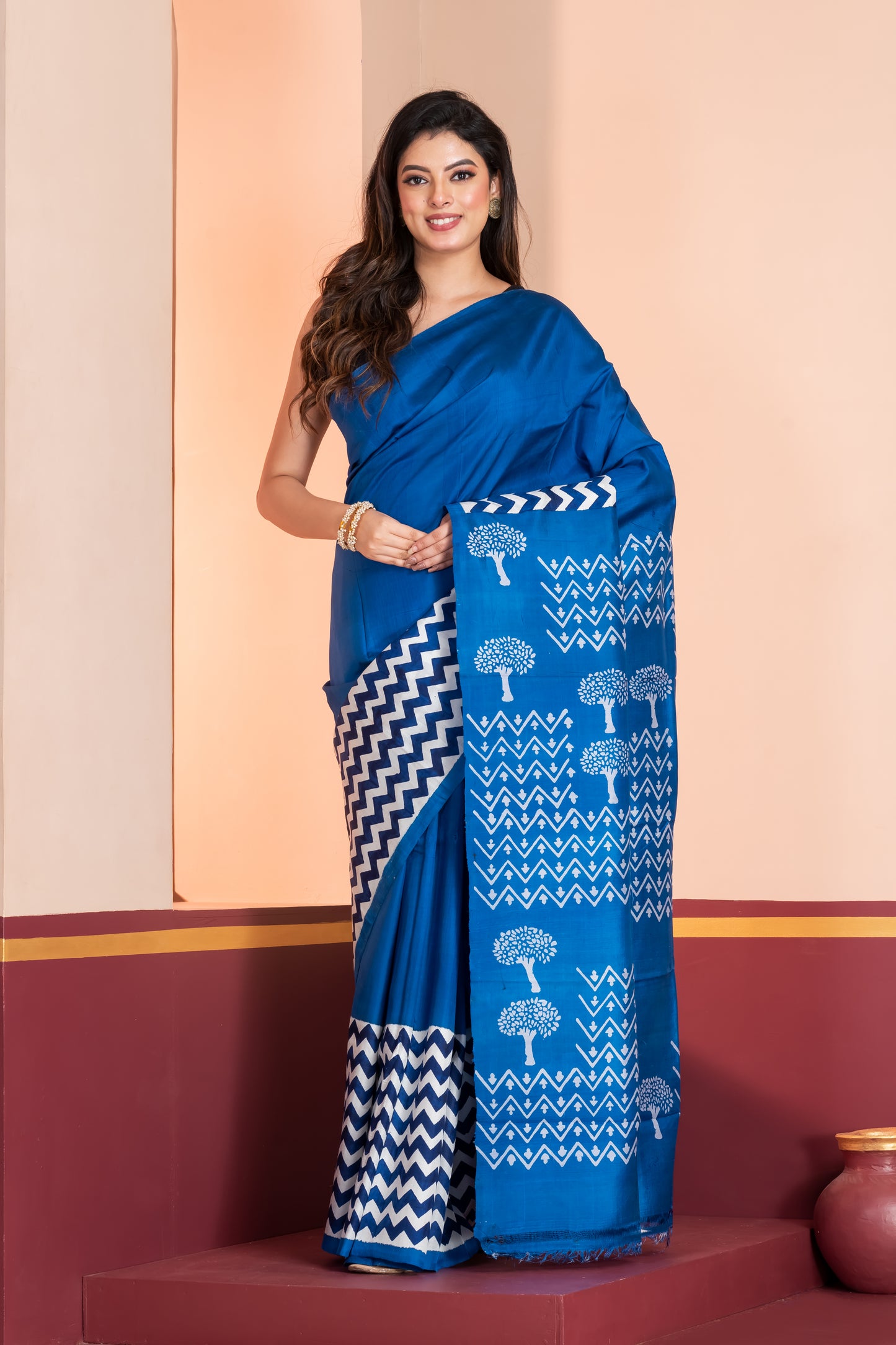 Royal blue 3ply silk. Paired with a plain blue blouse piece for a graceful finish.