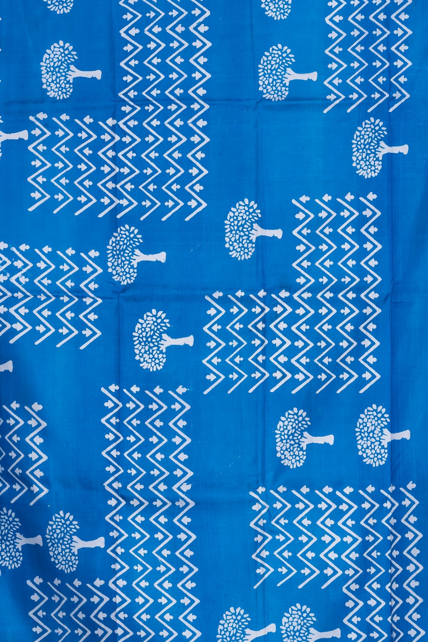 Royal blue 3ply silk. Paired with a plain blue blouse piece for a graceful finish.