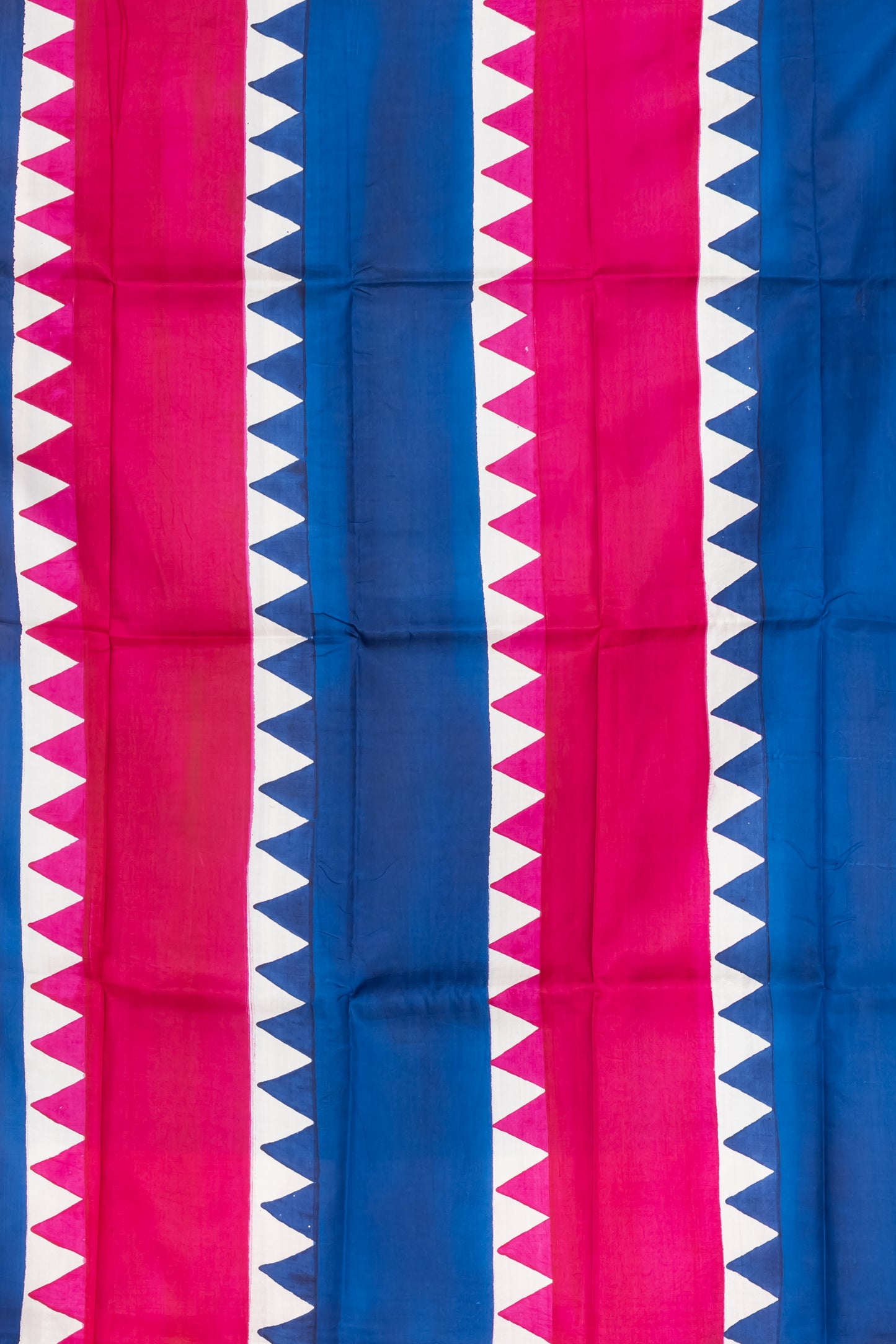 Deep pink and blue temple border, with owl motif prints.