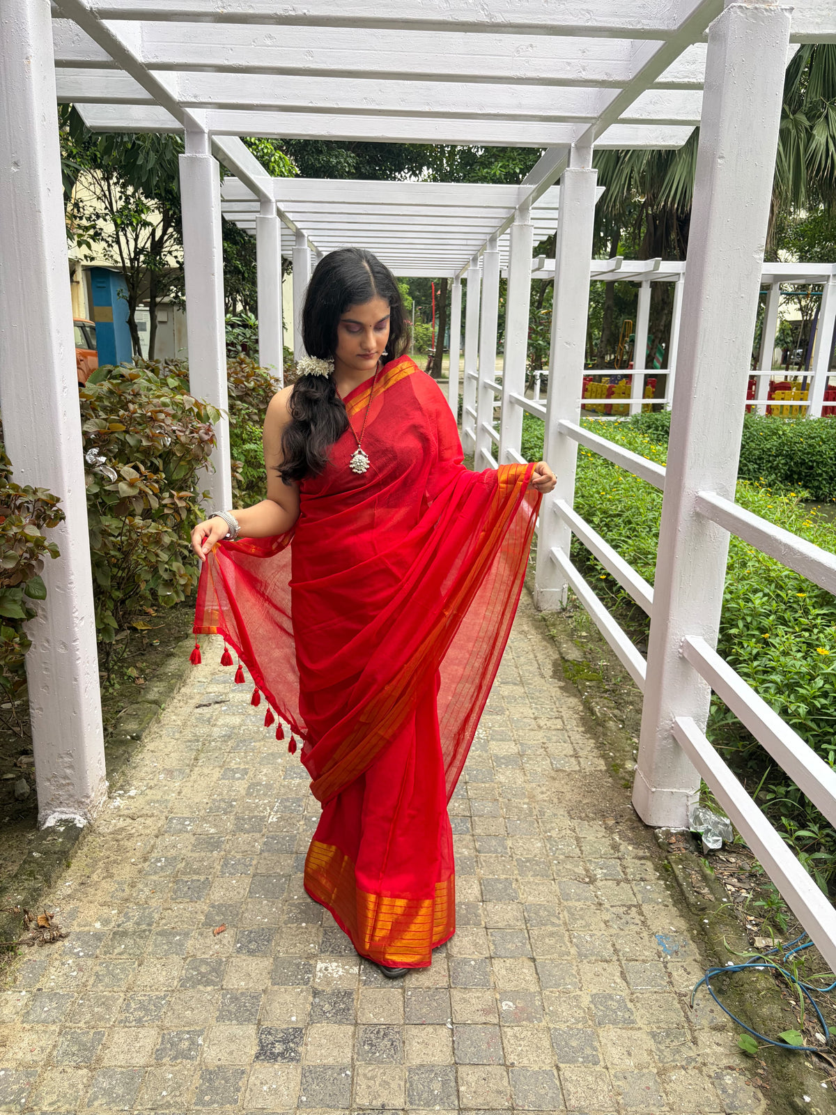 Red mul cotton saree golden striped border