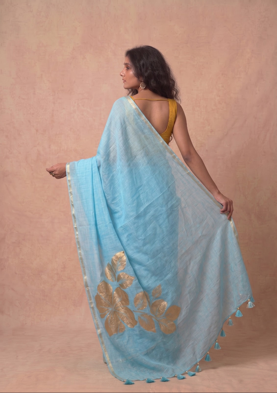 Golden flower sky blue mulmul cotton saree