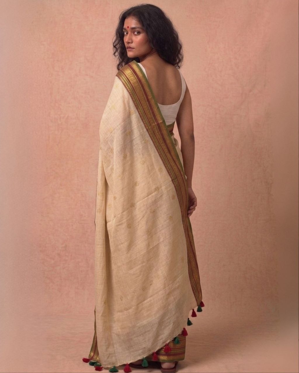 Off white multi color kanchi border mulmul saree