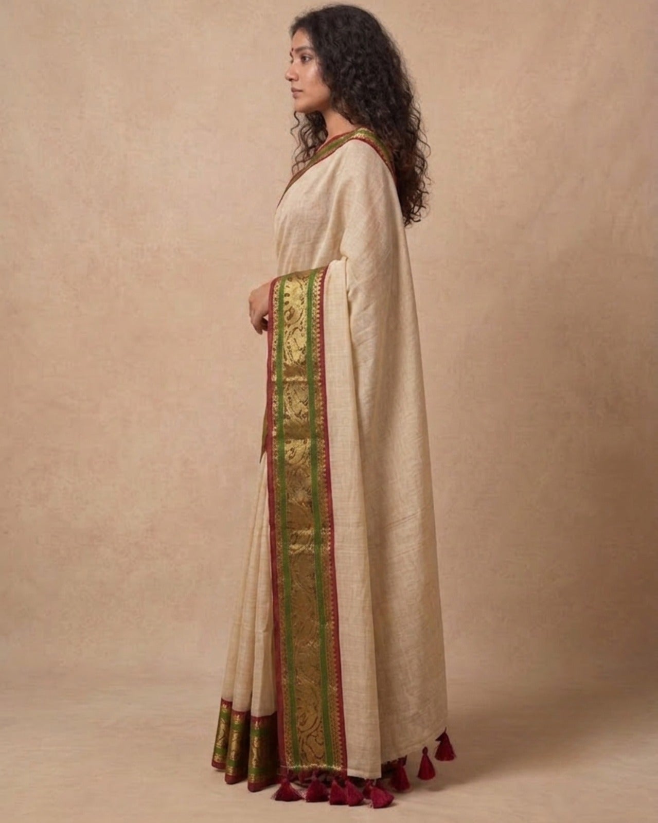 Off white green zari border mulmul saree