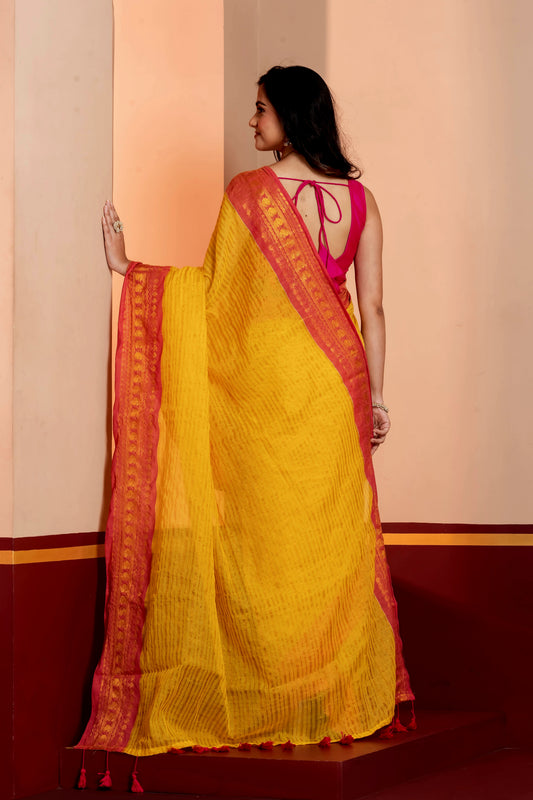 Yellow striped pink kanchi border mulmul saree