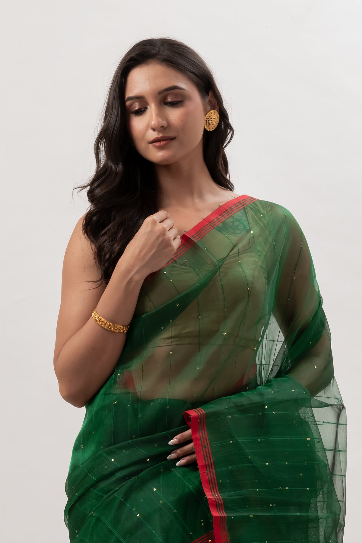 Deep Green Sheer Muslin Saree with Vibrant Paithani pallu motif