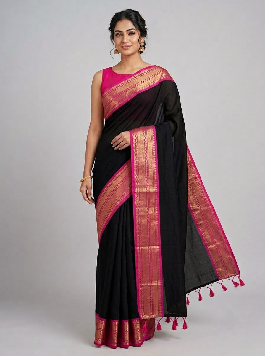 Classic black mulcotton saree with Contrast Pink and Gold Zari Border