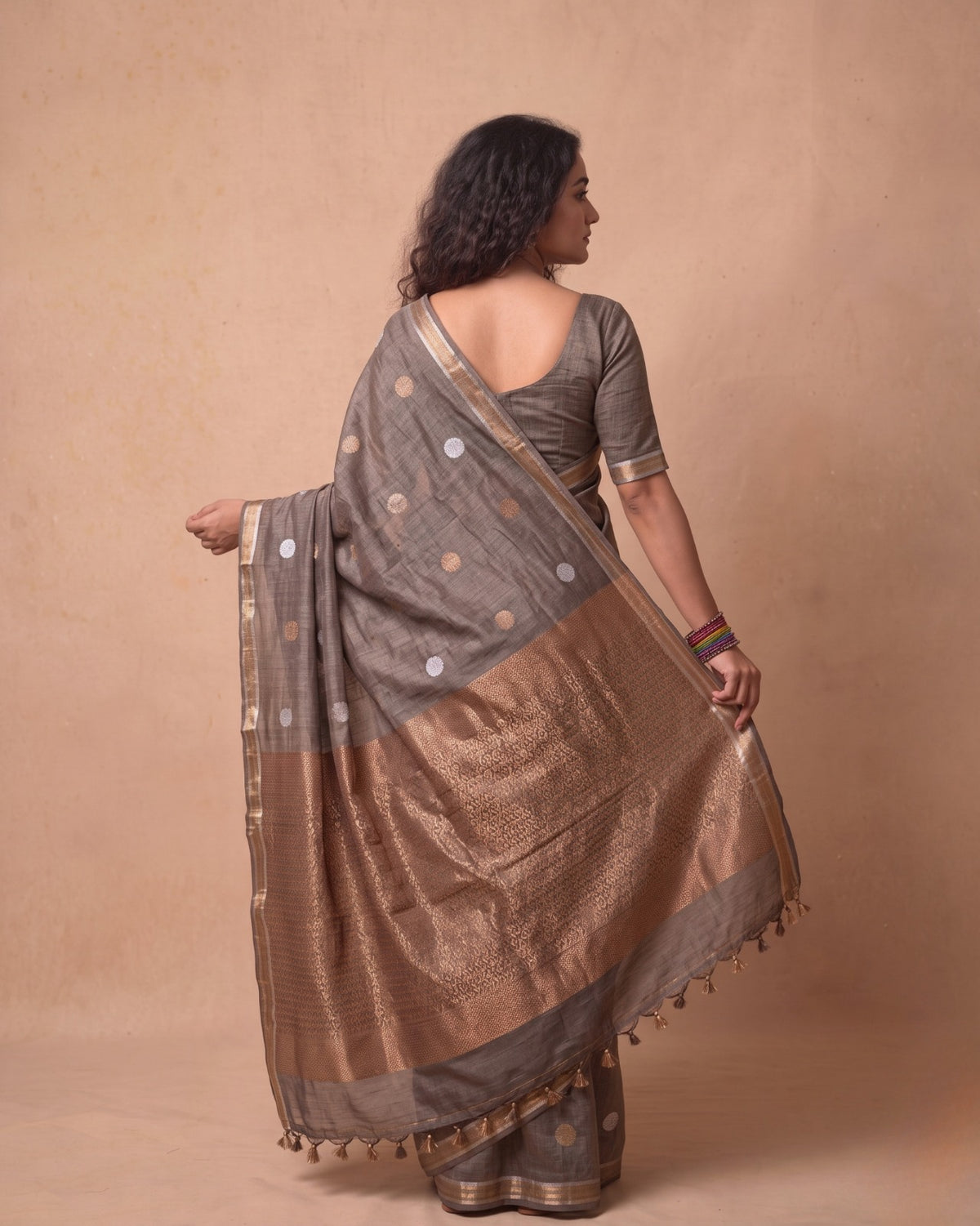Tissue Tussar Saree in Deep Grey with Zari Border & Tassels