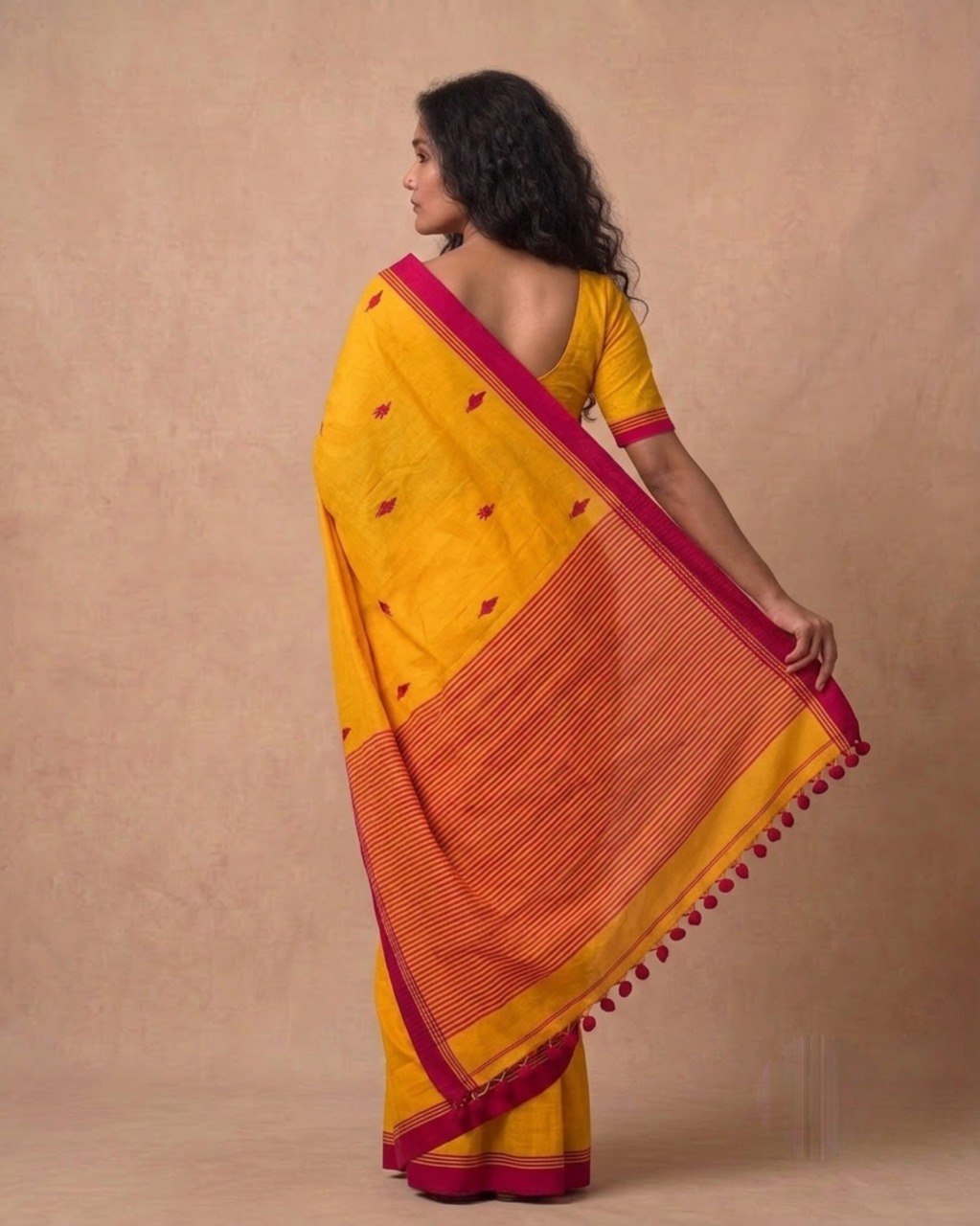 Mustard yellow handspun cotton saree with red bootis