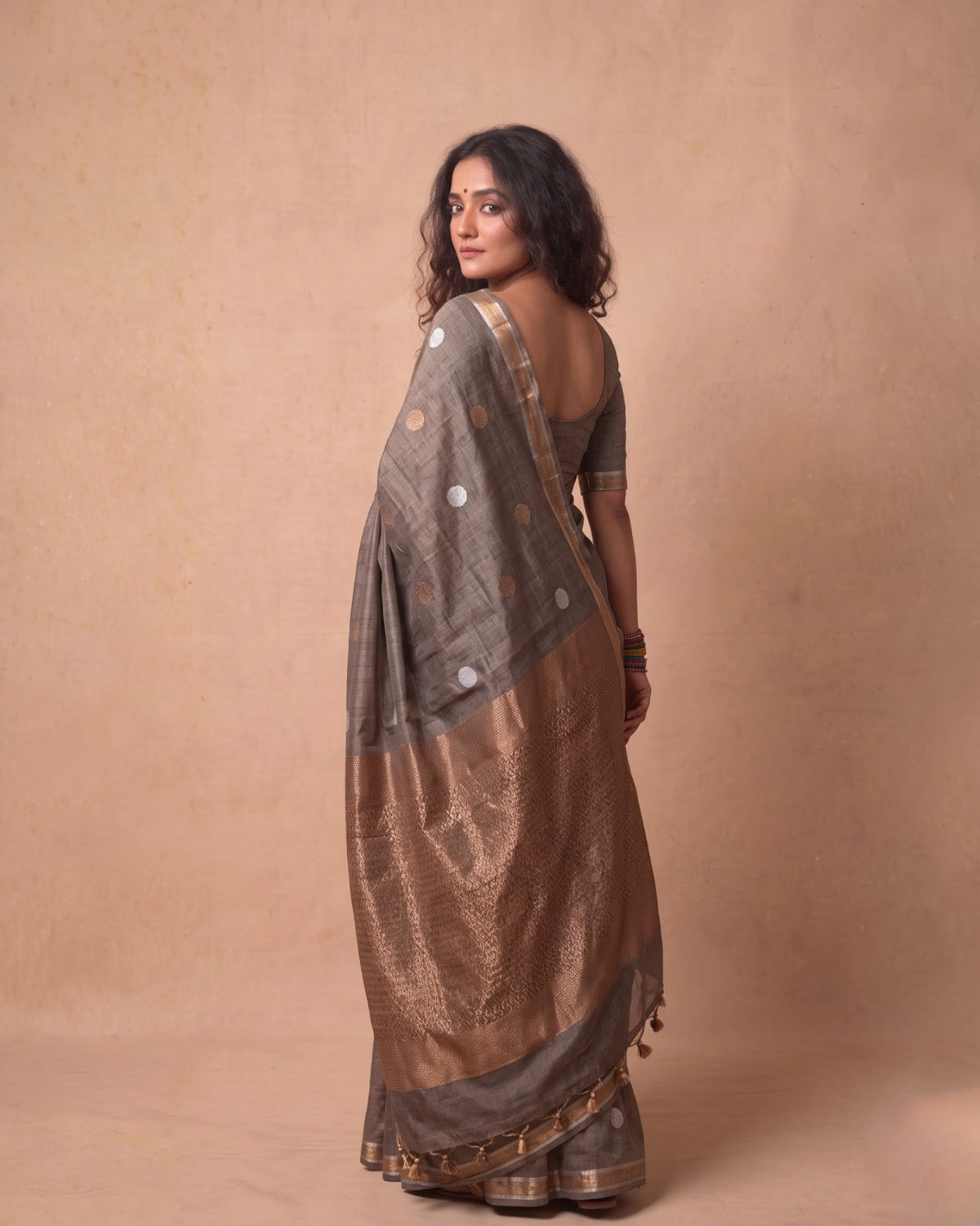 Tissue Tussar Saree in Deep Grey with Zari Border & Tassels