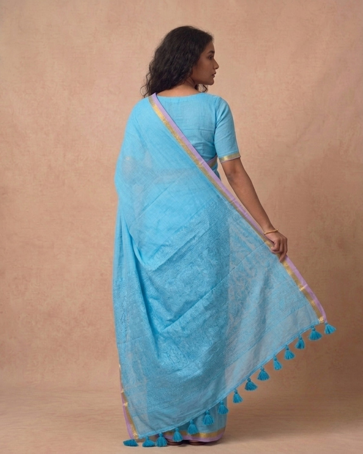 Sky blue mulmul cotton saree with subtle zari border