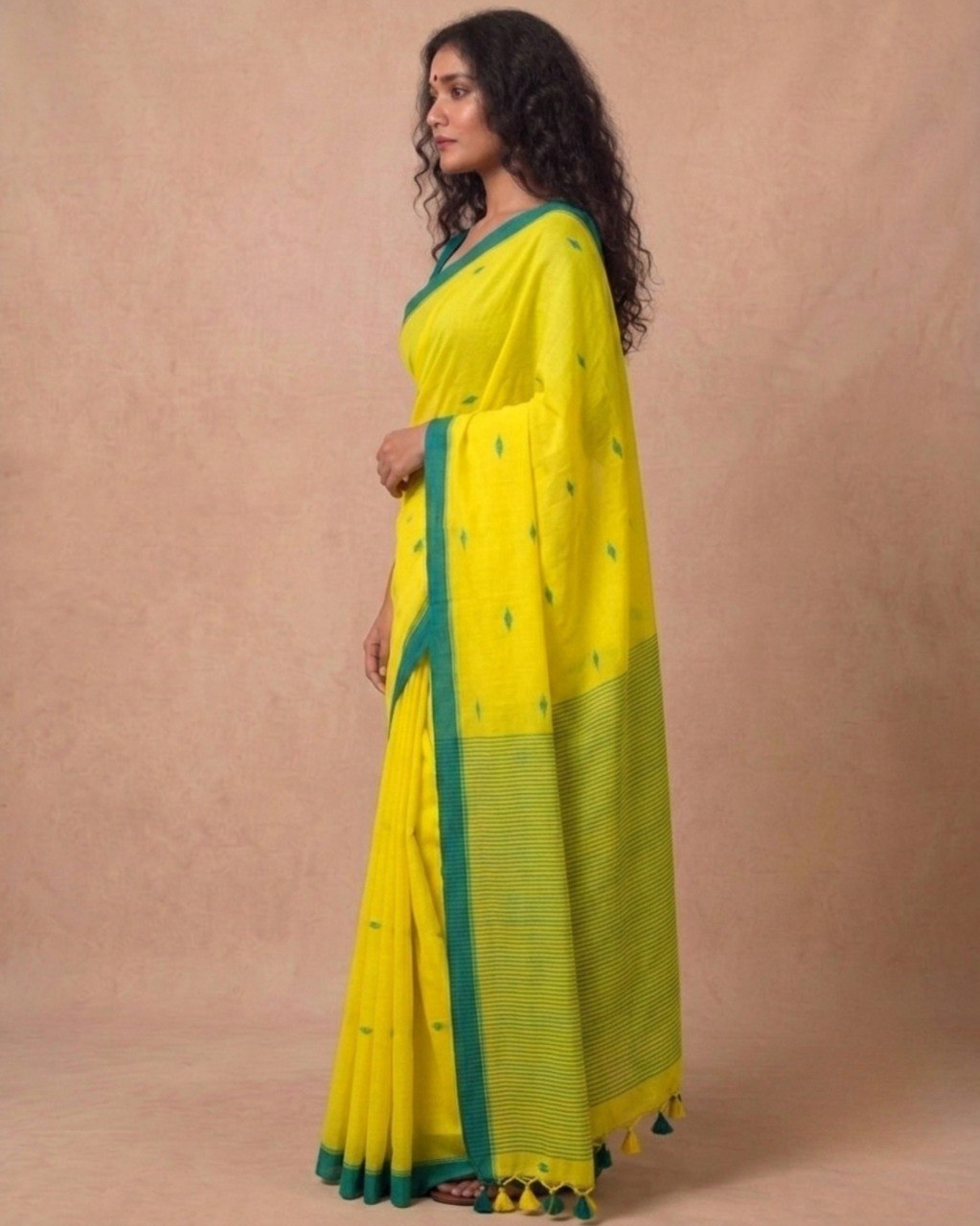 Turmeric yellow handspun cotton saree with green bootis