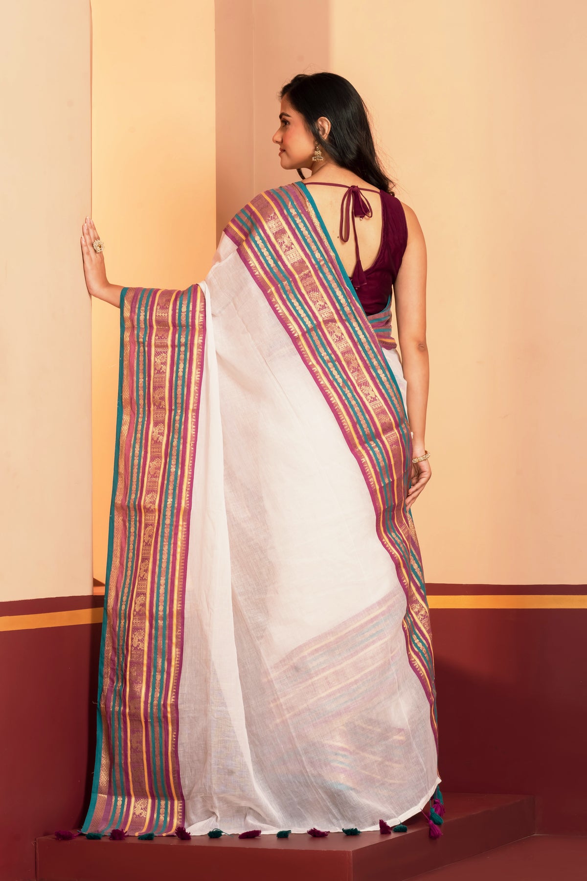 Teal blue kanchi border beige mulmul cotton saree
