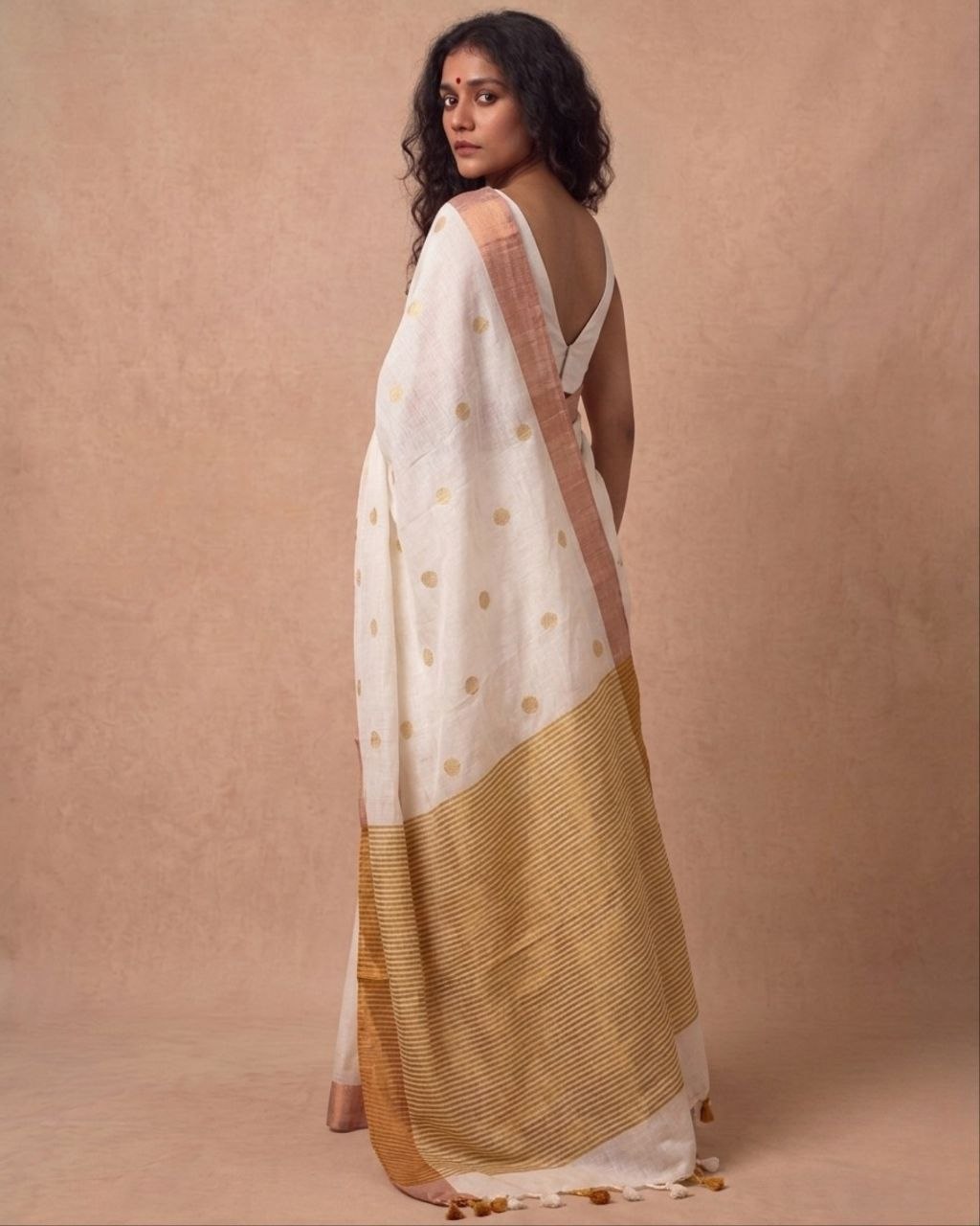 Off white mulmul cotton saree with gold dots