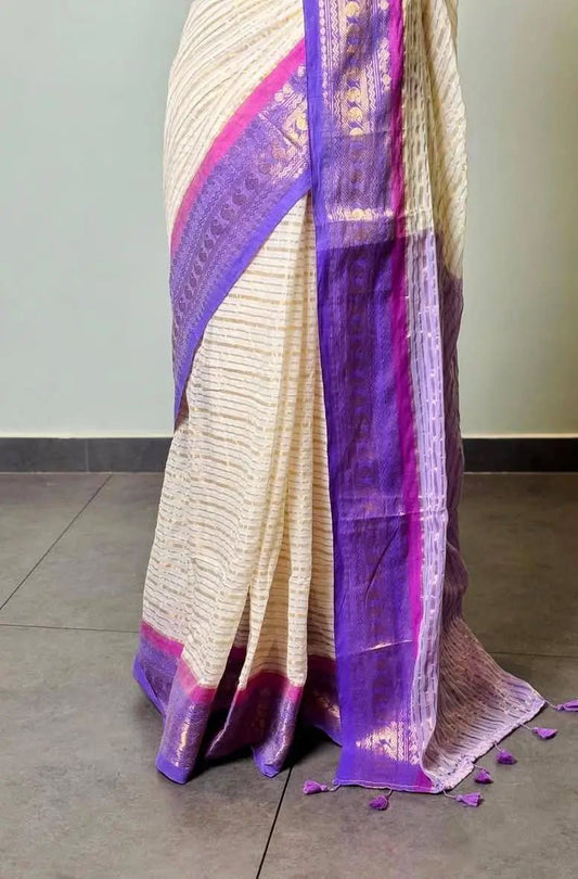 Off white striped base mauve kanchi border mulmul saree