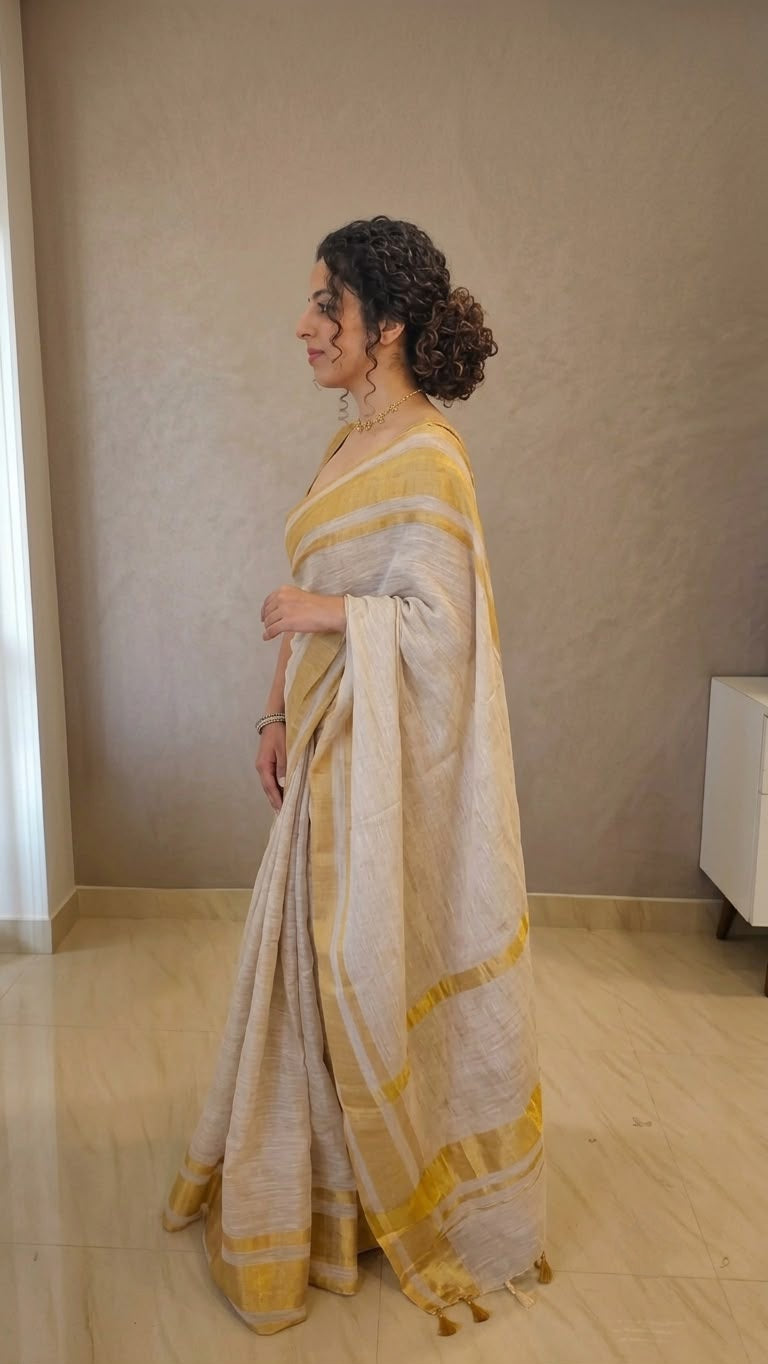 Golden zari border pure linen saree