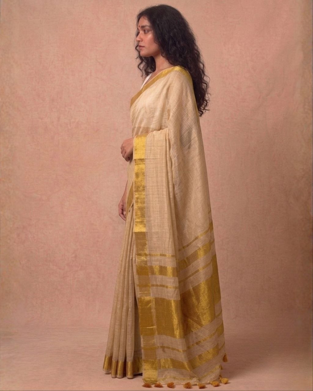 Offwhite golden zari border tissue kasavu saree