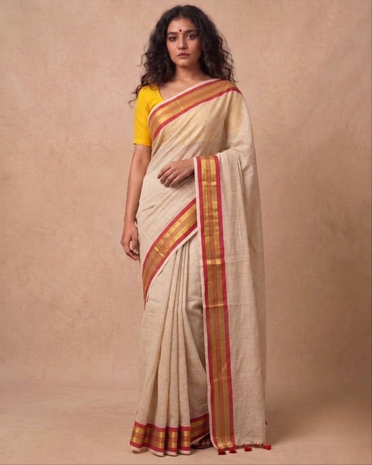 Off white red zari border mulmul saree