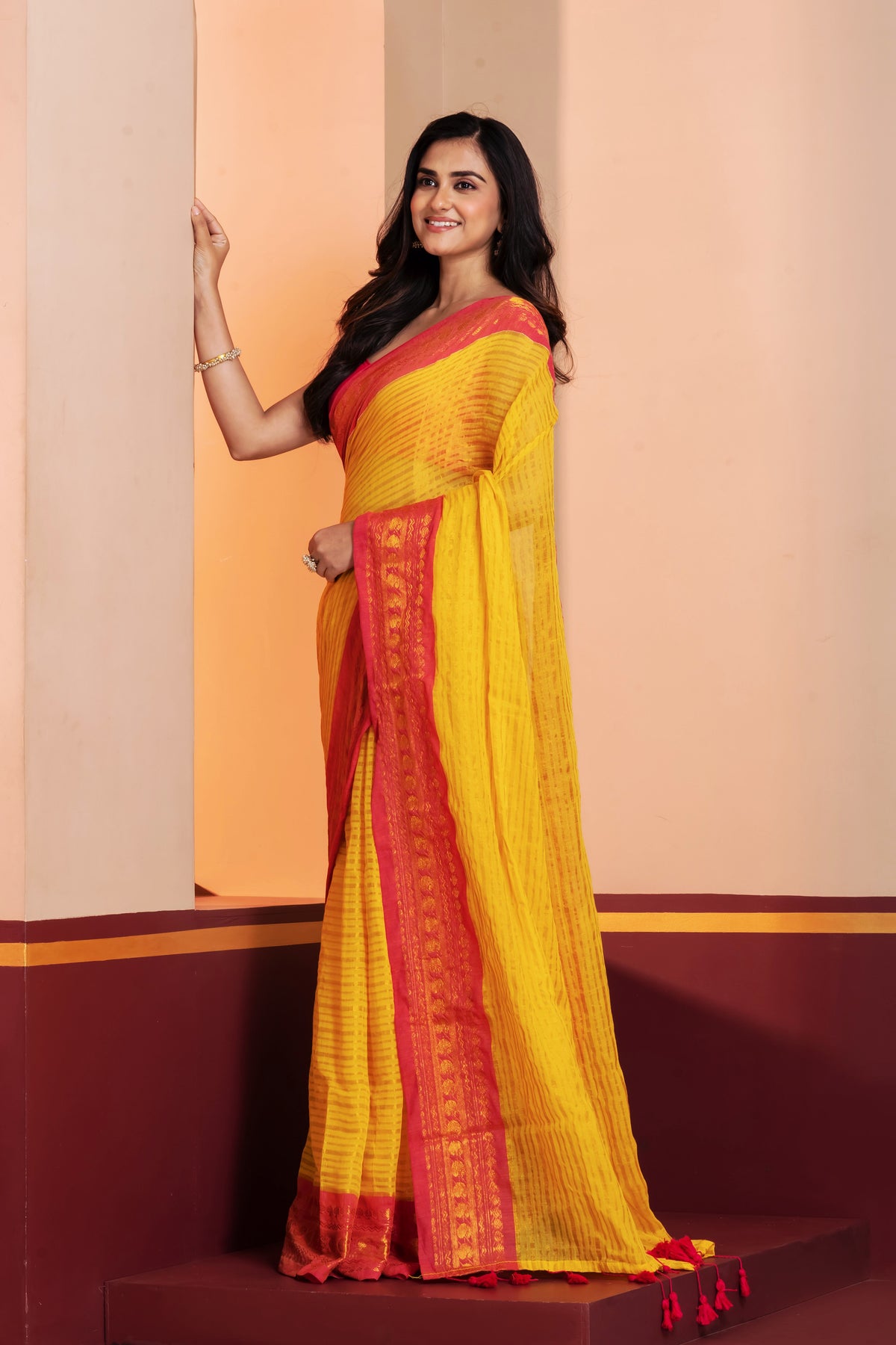 Yellow striped pink kanchi border mulmul saree
