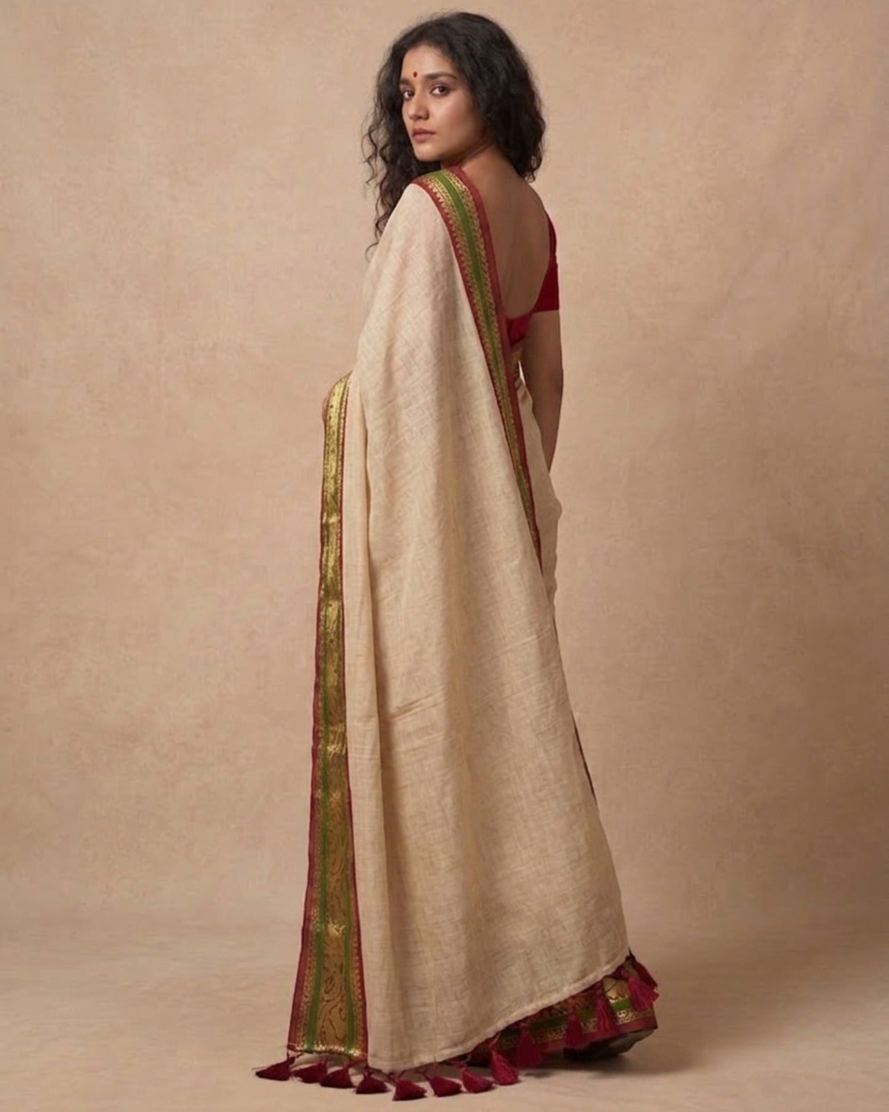 Off white green zari border mulmul saree