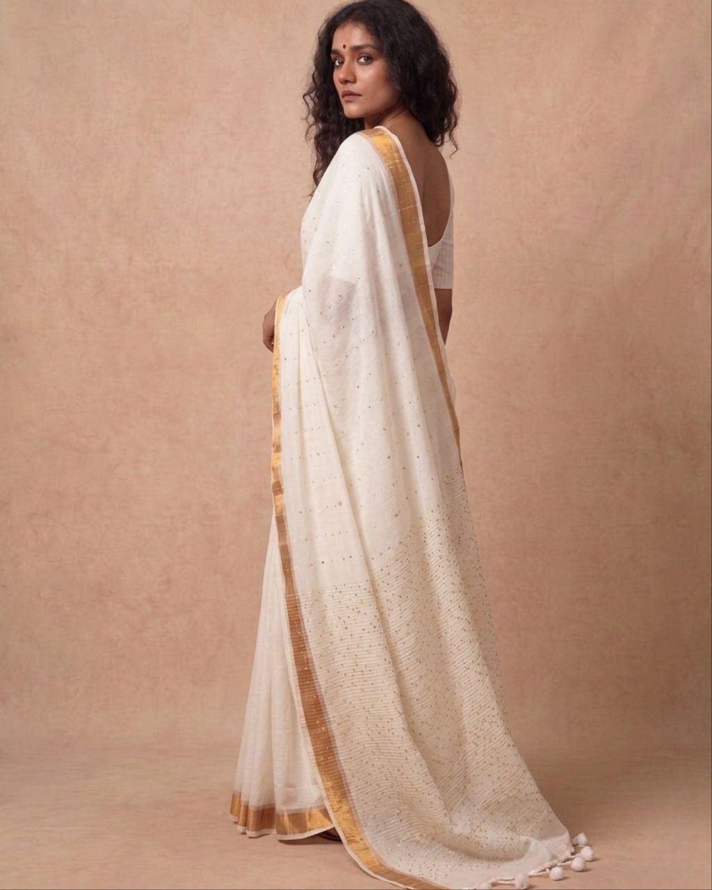 Off white mulmul cotton saree with mini sequins