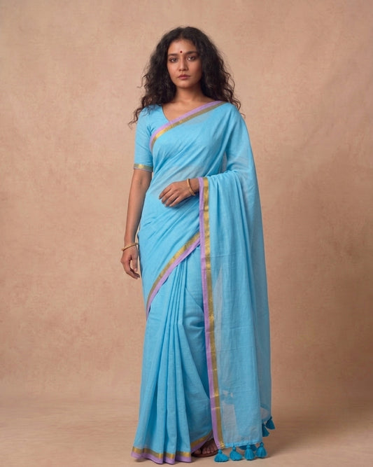 Sky blue mulmul cotton saree with subtle zari border