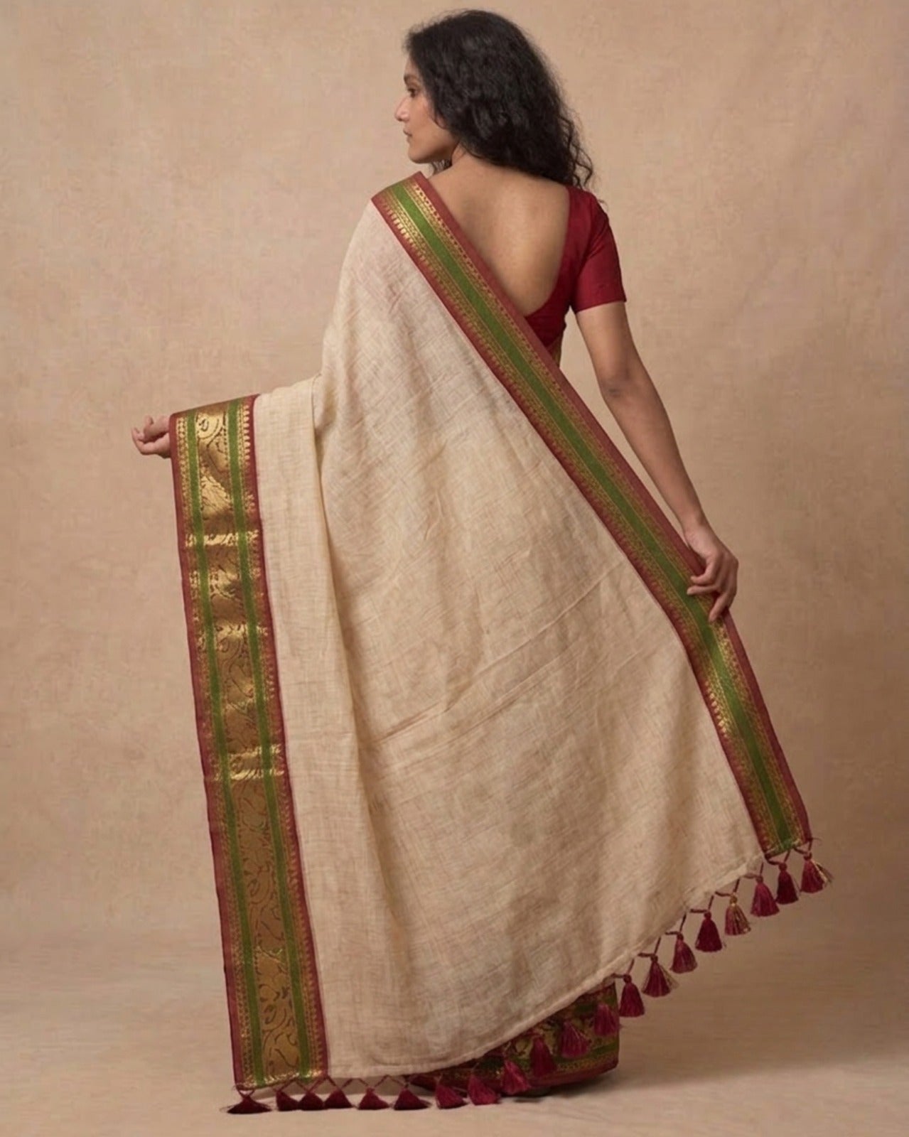 Off white green zari border mulmul saree