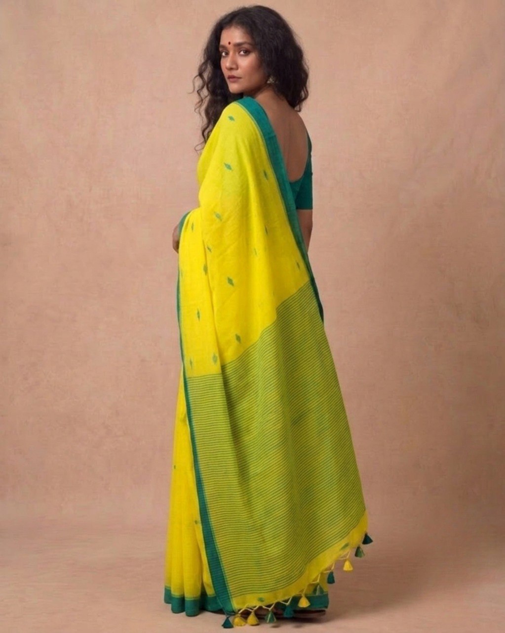 Turmeric yellow handspun cotton saree with green bootis