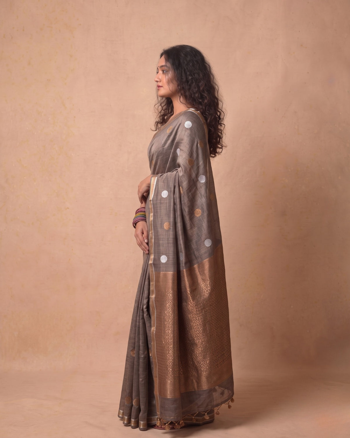 Tissue Tussar Saree in Deep Grey with Zari Border & Tassels