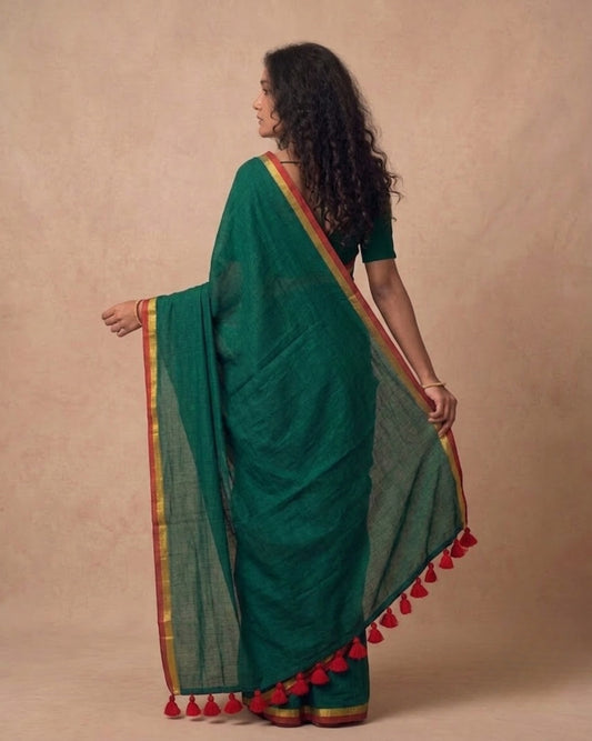Dark green mulmul cotton saree with red n gold zari border