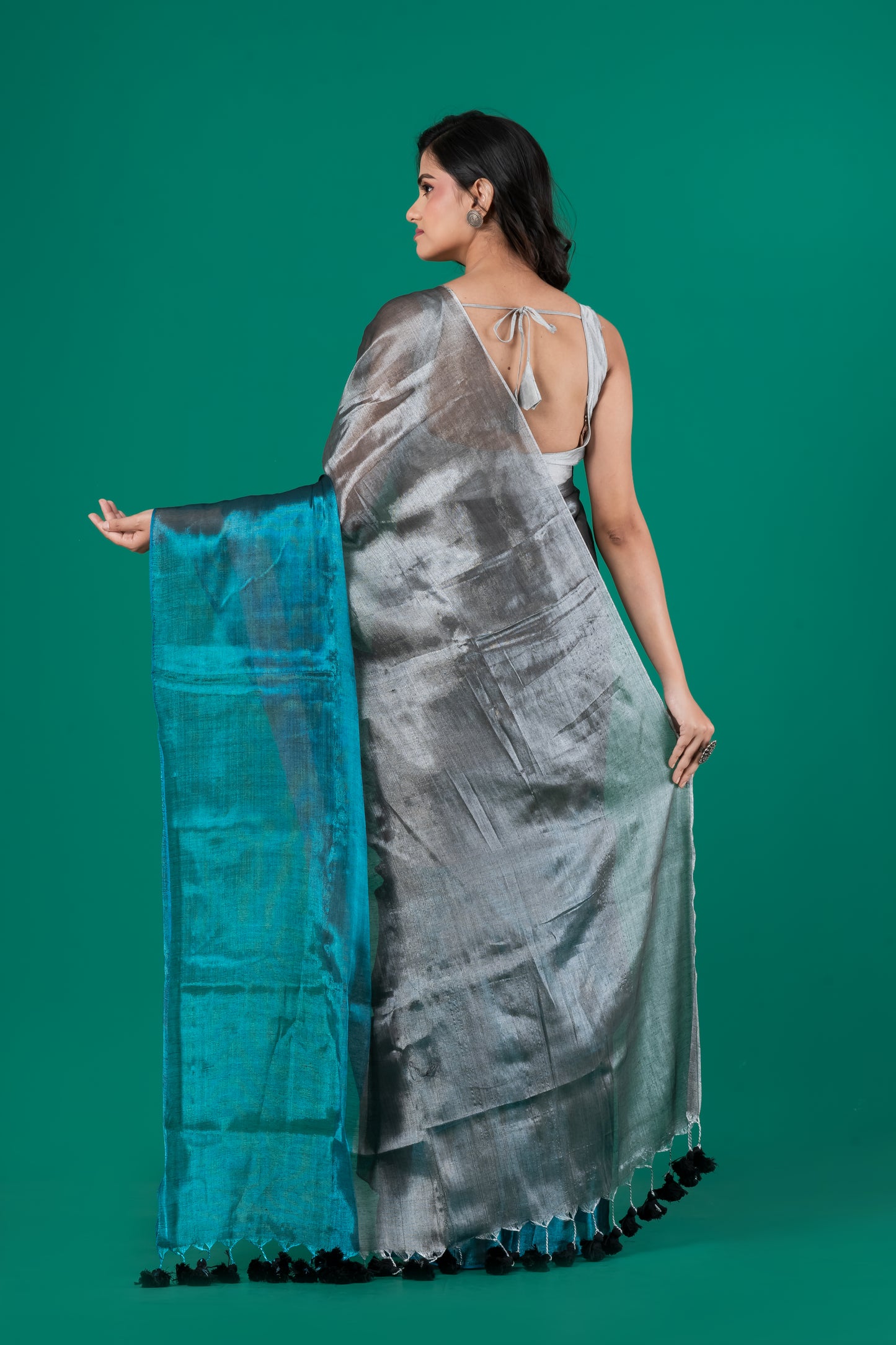 Metallic silver meets teal in Tissue cotton saree